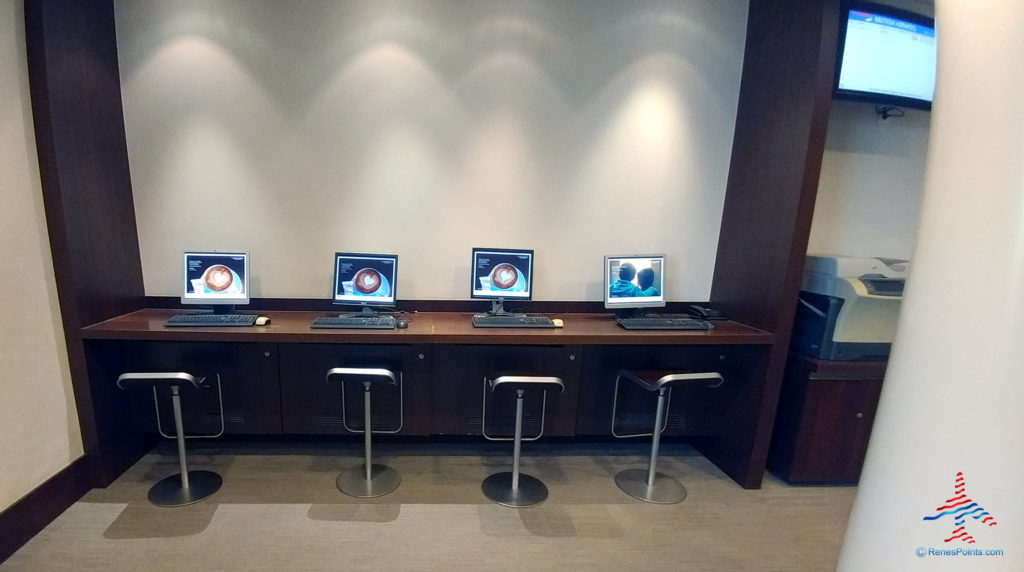 a row of computers on a table