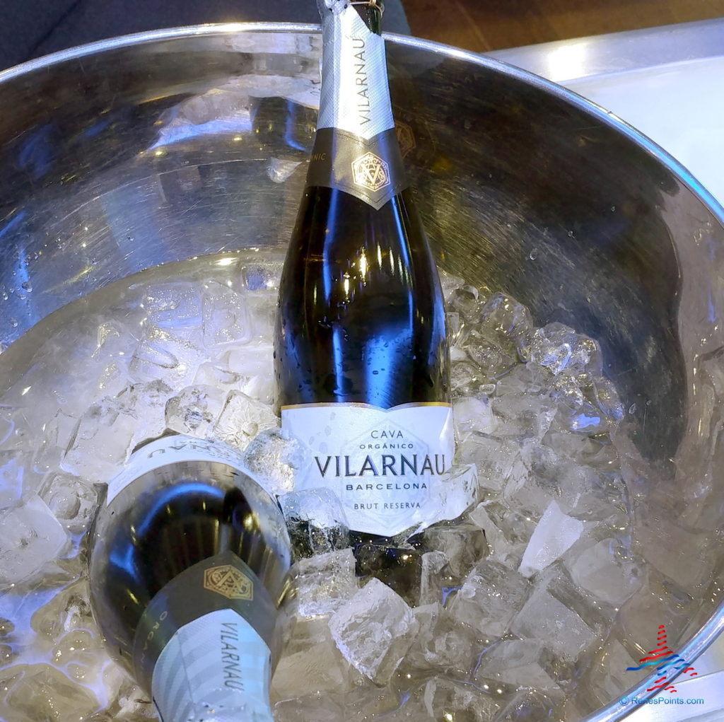 a bottle of wine in a bucket of ice