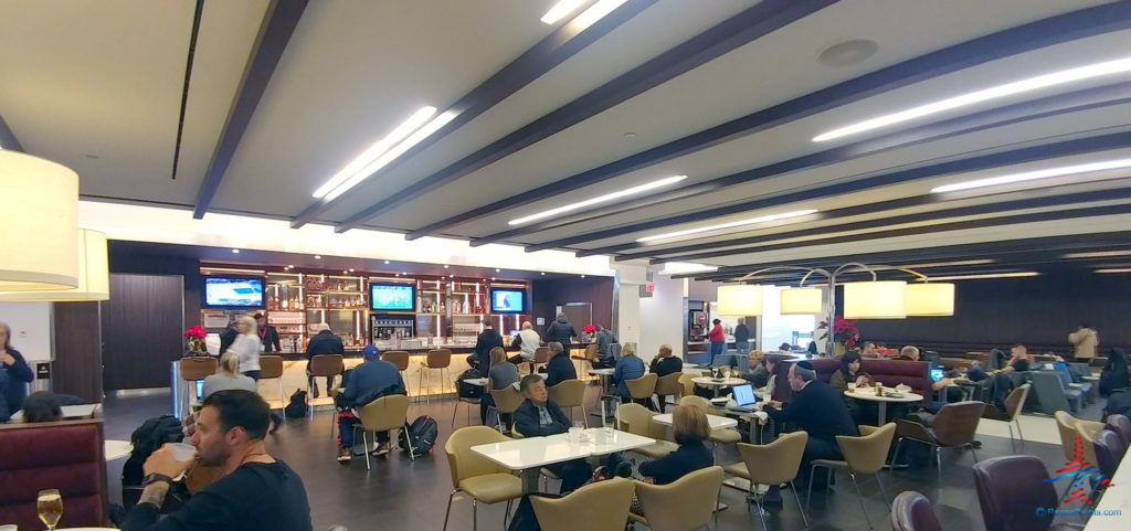 a group of people sitting at tables in a room