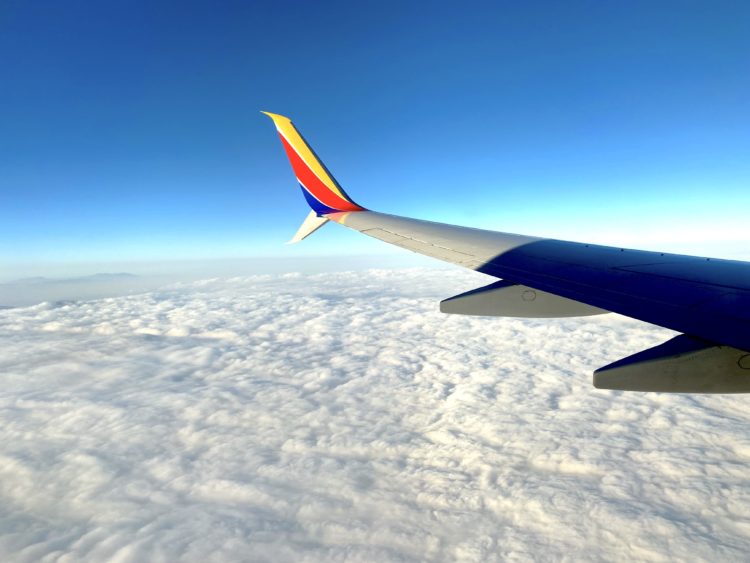 A Southwest 737 wing is seen inflight.