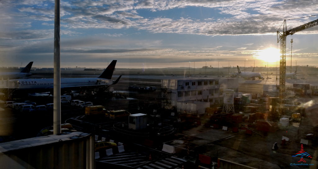 an airport with airplanes and buildings