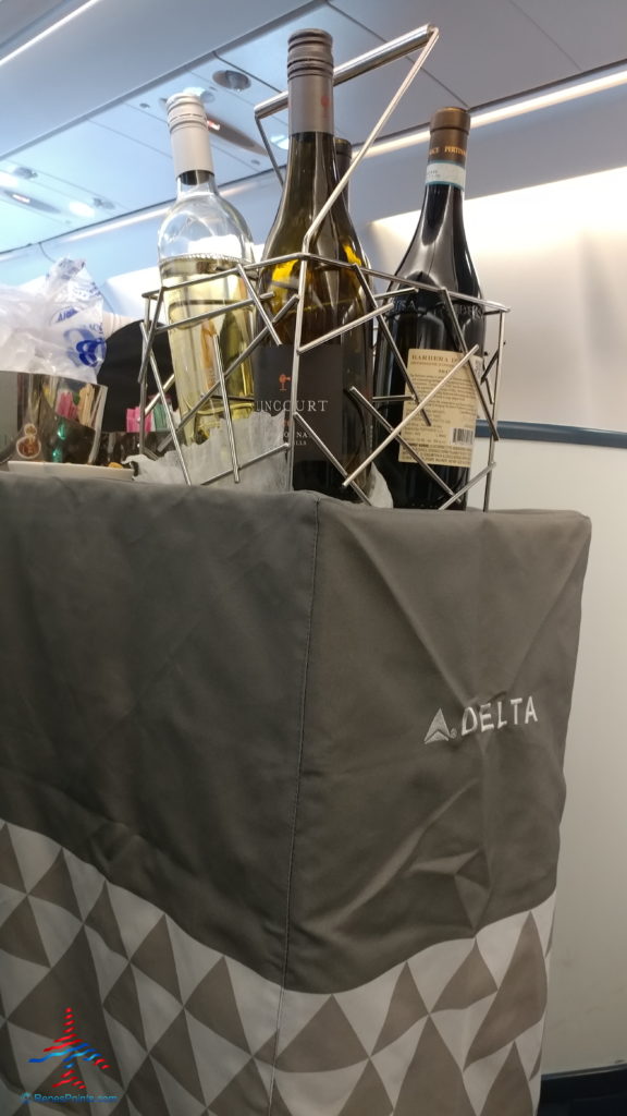 a basket of wine bottles