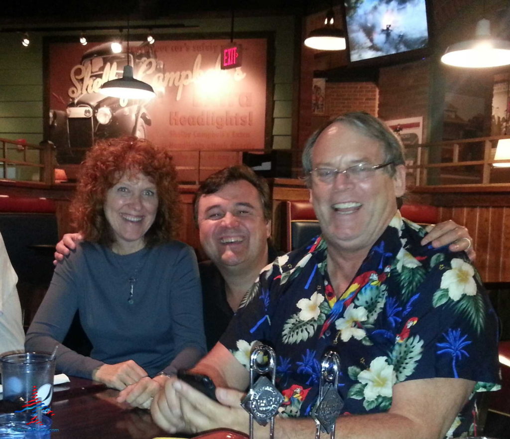 a group of people sitting at a table