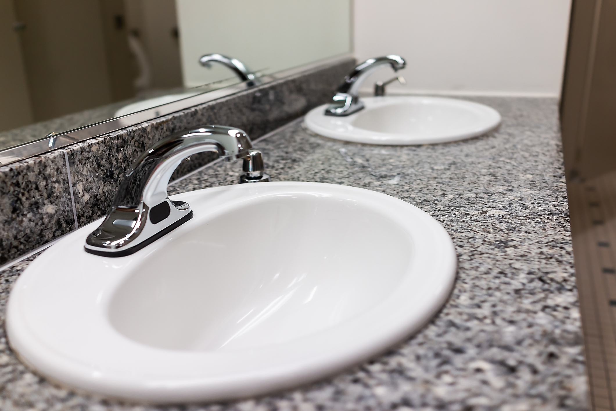 Sinks in a public restroom. Eye of the Flyer