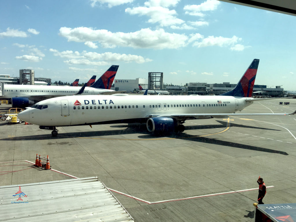 A Delta Air Lines 737-900ER, tail number N815DN, is seen from the Detla Sky Club at the Seattle-Tacoma International Airport (SEA) in Seattle, Washington.