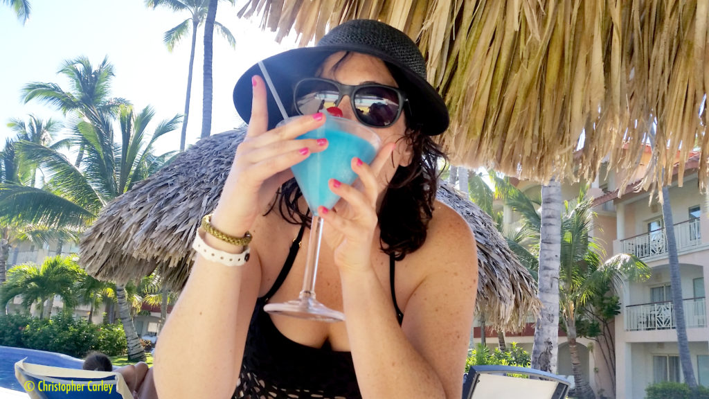 Chris' wife sips a frozen cocktail at an all-inclusive Majestic Resorts property in Punta Cana, Dominican Republic.