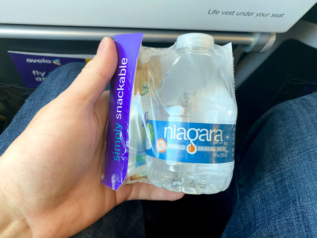 A snack pack is seen on a tray table during Avelo Airlines’ first passenger flight, XP101. The trip traveled from Hollywood Burbank Airport in Burbank, California (BUR) to Charles M. Schulz–Sonoma County Airport in Santa Rosa, California (STS) on Wednesday, April 28, 2021.