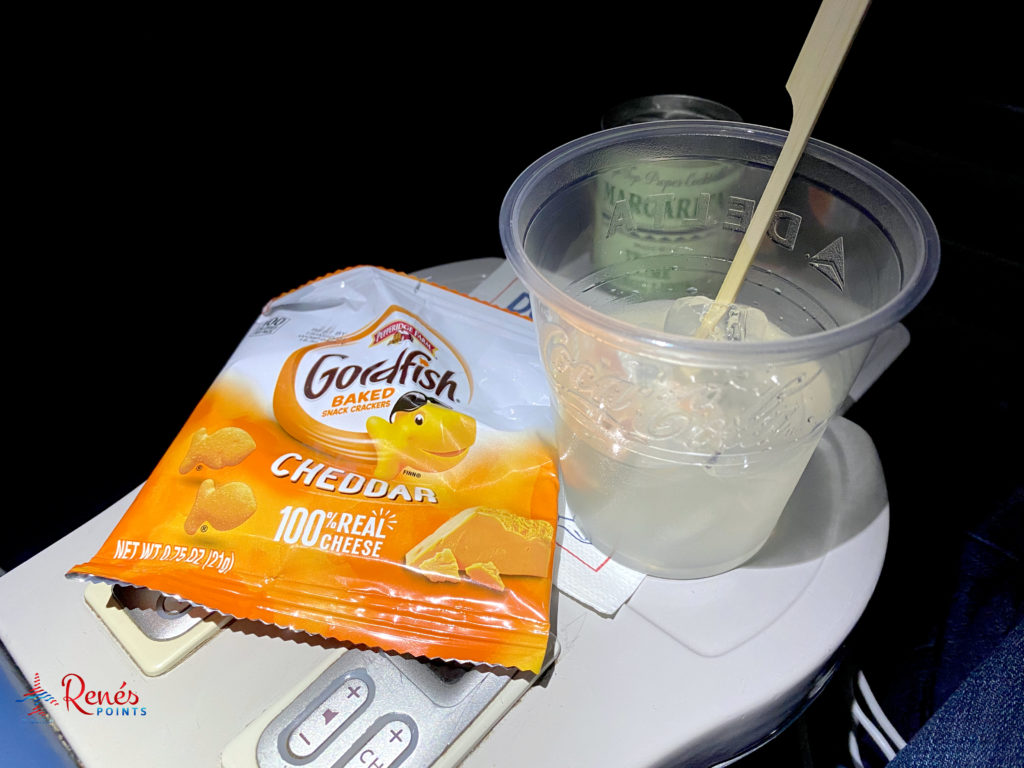 Finding a good snack such as Goldfish crackers can add some saltiness to your canned margarita experience.