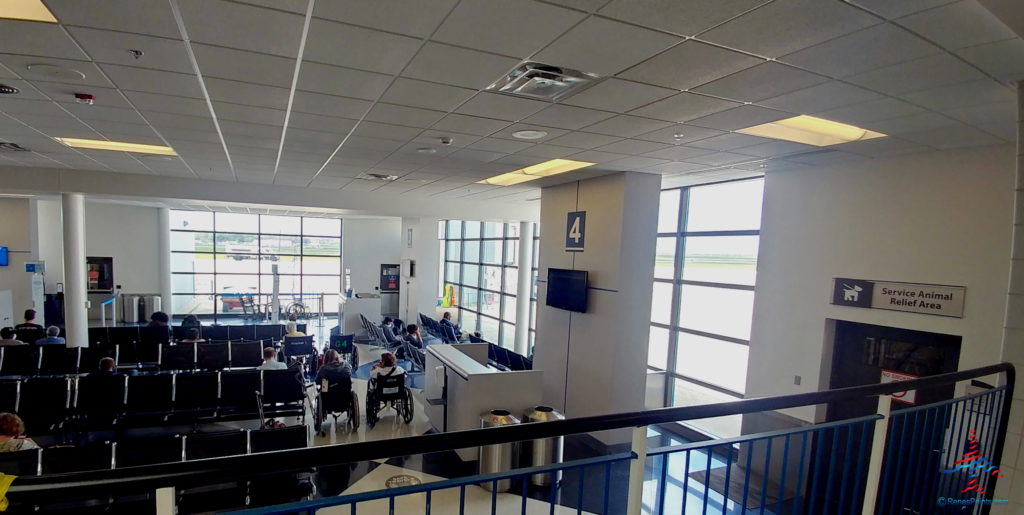 a group of people in wheelchairs in a building