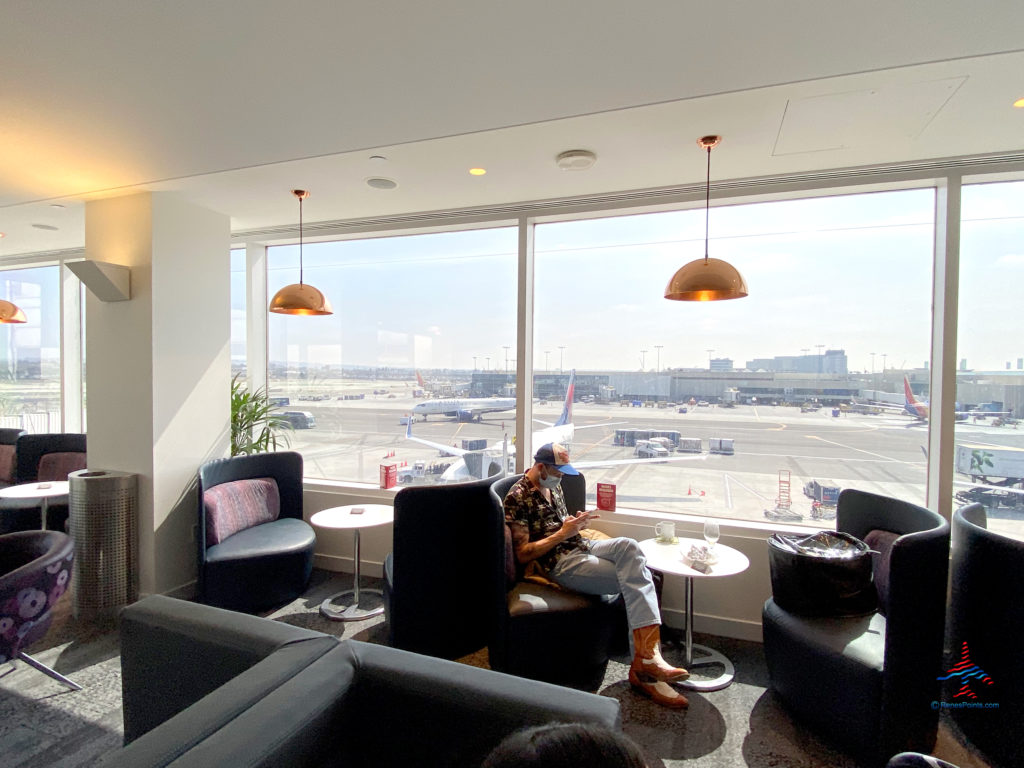 Delta Air Lines and Terminal 1 are seen from inside the Delta Sky Club “satellite” annex airport lounge inside Terminal 2 (T2) at Los Angeles International Airport (LAX) in Los Angeles, CA.