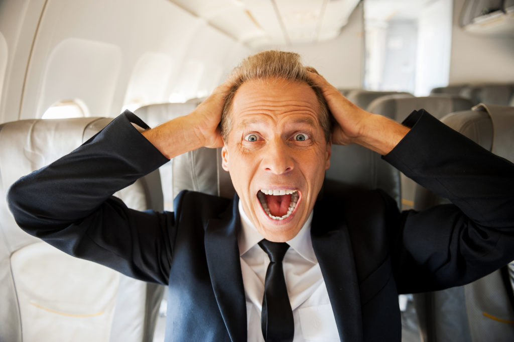 Freaked out, scared airplane passenger