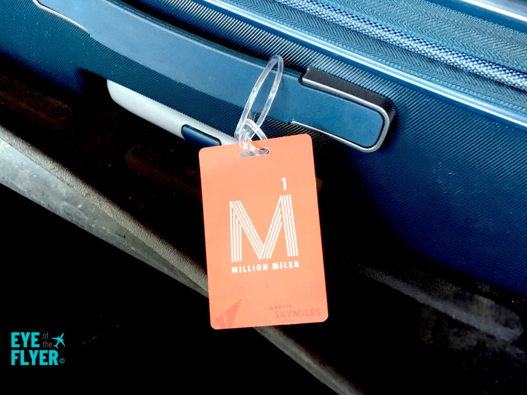 A Delta Million Miler bag tag on baggage.