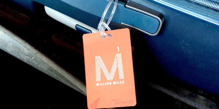 A Delta Million Miler bag tag on baggage.