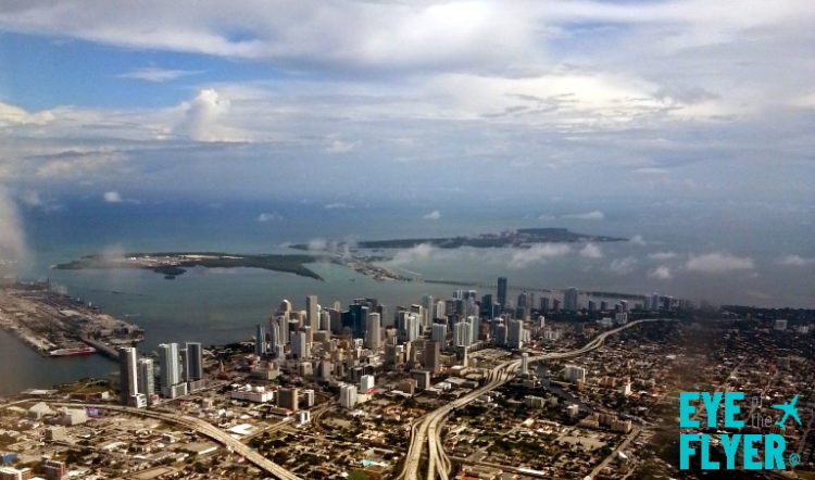 a city with many tall buildings and a body of water