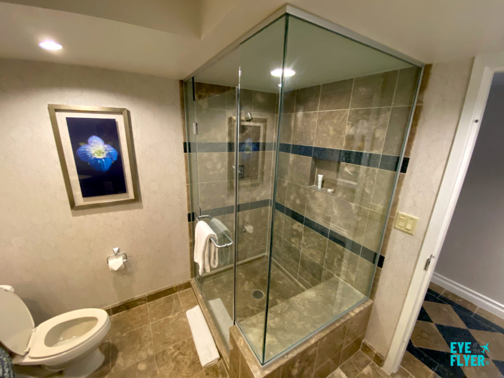 A view of the toilet and glassed-in shower inside the bathroom of a Spa Tower kingsize bedroom at Bellagio Resort & Casino Las Vegas. Bellagio is located on the Las Vegas Strip in Paradise, Nevada.