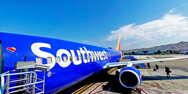 A Southwest Airlines 737-800 boards passengers at Hollywood Burbank Airport (BUR) in Burbank, California.
