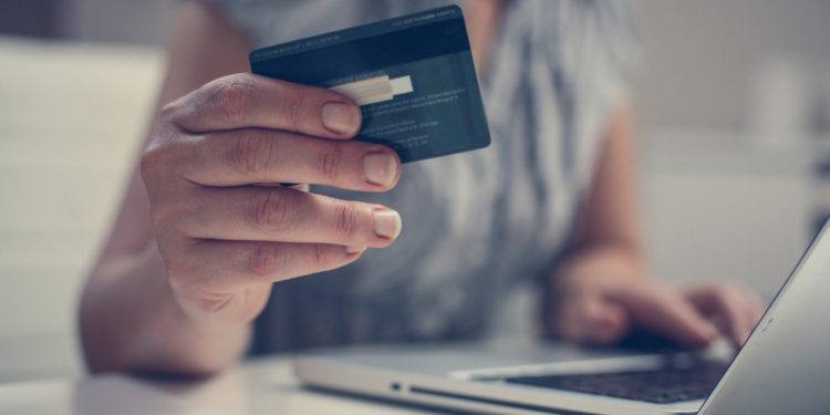 Woman with a business credit card
