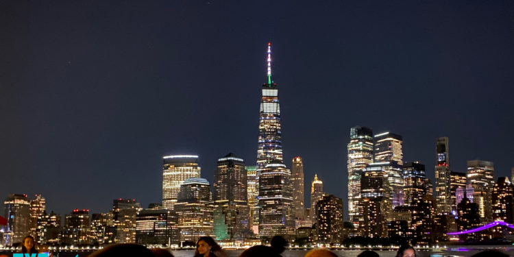 A view of One World Trade Center at night during a Circle Line Harbor Lights Cruise.