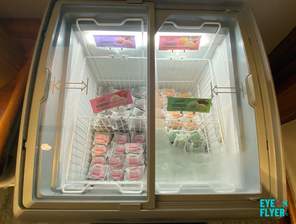Bubbies Mochi ice cream treats (strawberry and green tea) are available in a freezer at the Delta Sky Club Honolulu airport lounge.