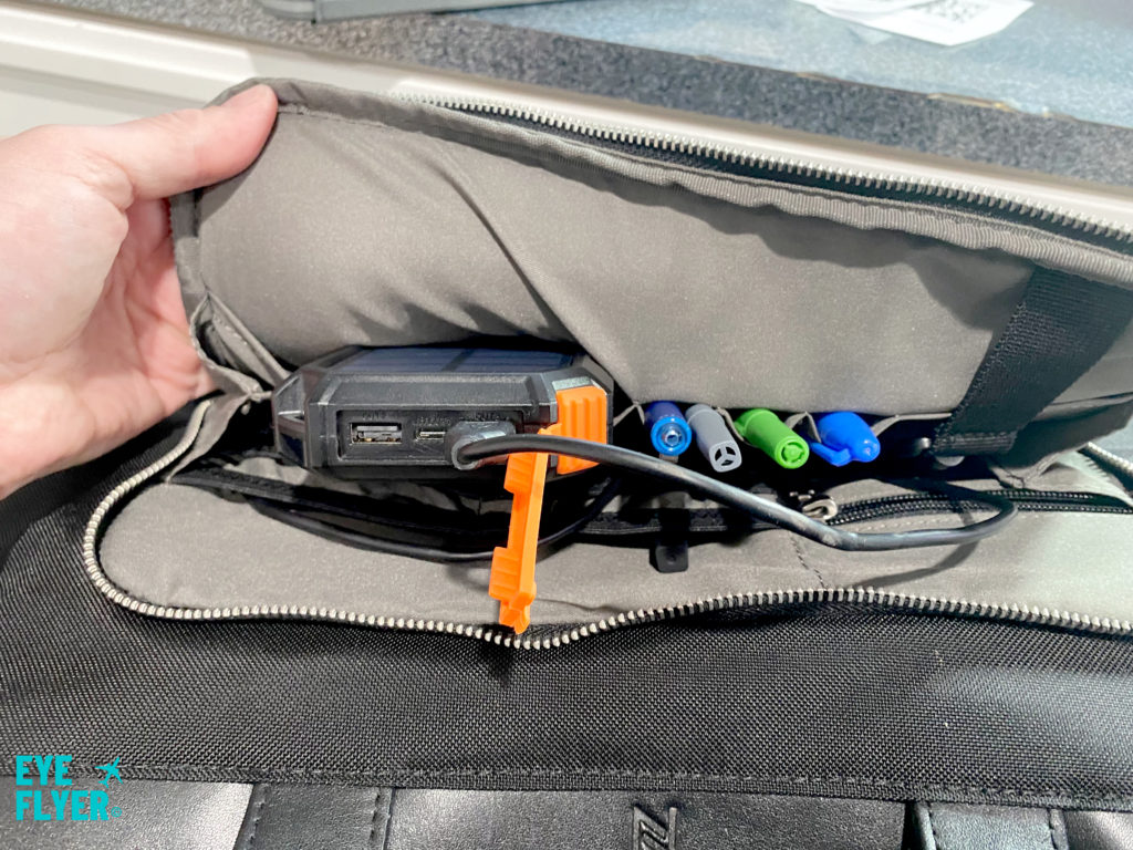 https://eyeoftheflyer.com/wp-content/uploads/2021/11/Nomad-Lane-Bento-Bag-USB-Battery-Pocket-1024x768.jpg
