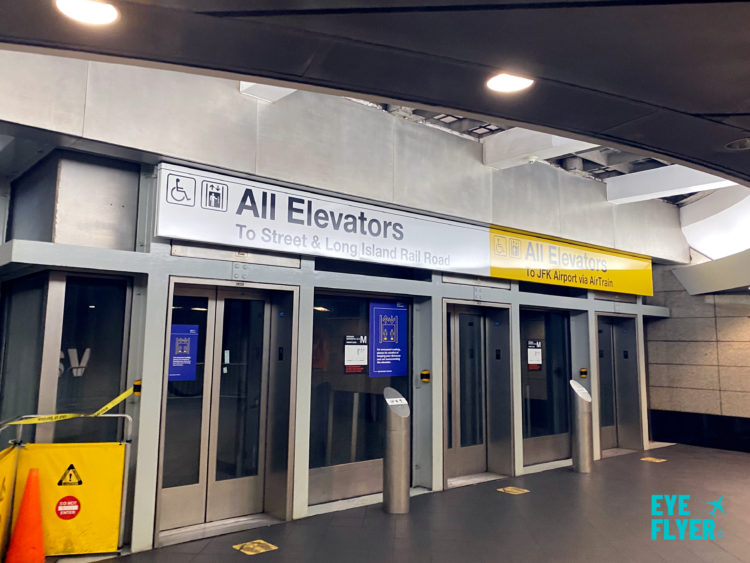 Taking the subway to JFK: AirTrain signs in Jamaica, Queens.