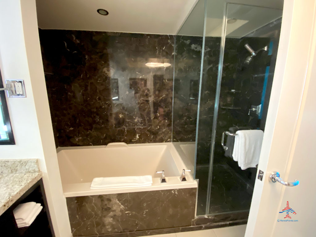 The bathtub and shower are seen inside a Delano Stay Well Suite at Delano Las Vegas, an MGM Resorts hotel part of the Mandalay Bay Resort Casino complex near the Las Vegas Strip in Paradise, Nevada.