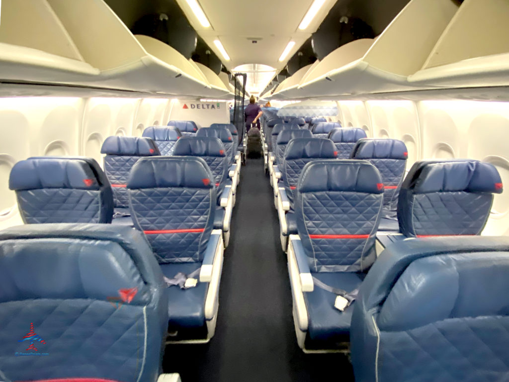 The first class cabin of a Delta Air Lines Boeing 737-900ER jet, registration number N876DN.