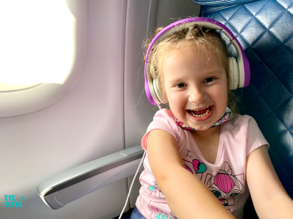 A young child sits in first class on a Delta Air Lines marketed flight.