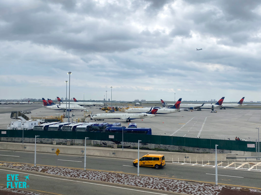 Delta Air Lines jets at JFK Airport seen from the AirTrain.