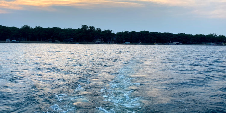 Taking an evening boat ride on a Minnesota lake.