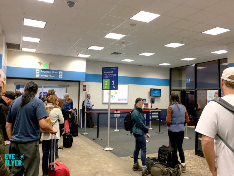 Passengers wait to board a Delta Air Lines flight at Gate B1 inside Terminal B at Hollywood Burbank Airport (BUR) in Burbank, California.