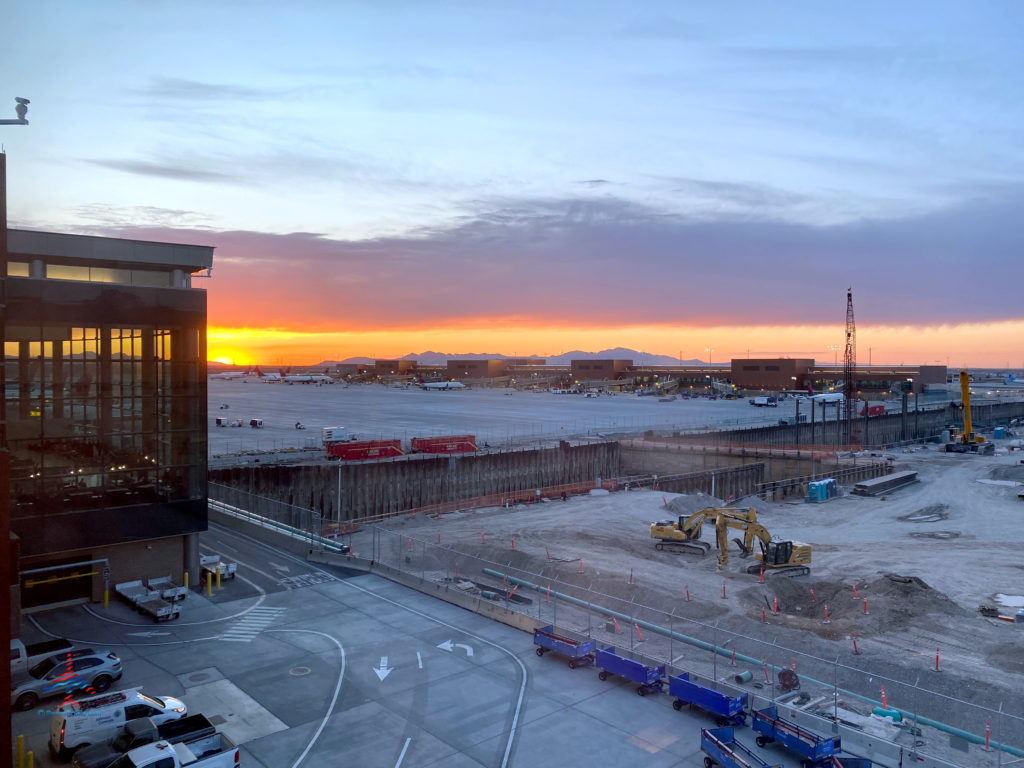 A sunset is seen from the Sky Deck patio during a visit to the Delta Sky Club Salt Lake City inside Terminal A of Salt Lake City International Airport (SLC). (Photo ©RenesPoints.com)