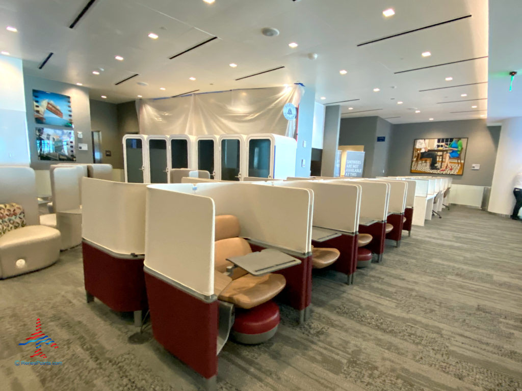 Rows of work cubicles are seen during a visit to the Delta Sky Club Salt Lake City inside Terminal A of Salt Lake City International Airport (SLC). (Photo ©RenesPoints.com)