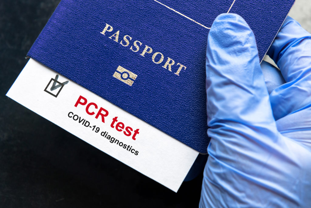 COVID PCR test and a passport