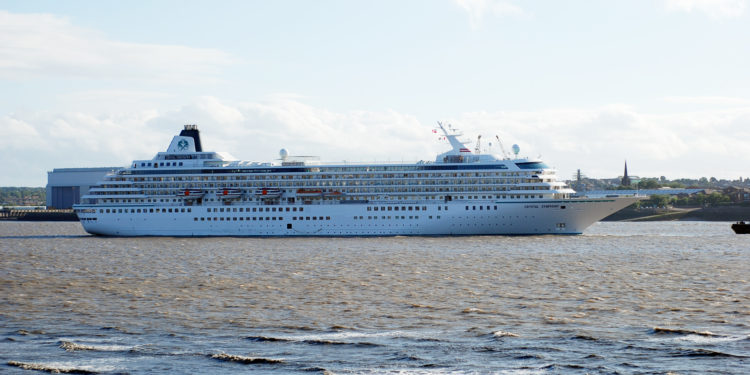Liverpool, England - July 20, 2008: Crystal Symphony cruise ship in the river Mersey, Liverpool. Crystal Symphony is a luxury cruise ship owned and operated by the luxury cruise line Crystal Cruises.