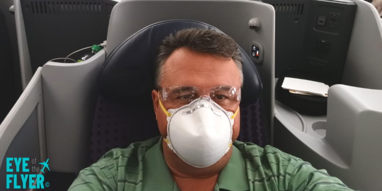 a man wearing a mask and goggles