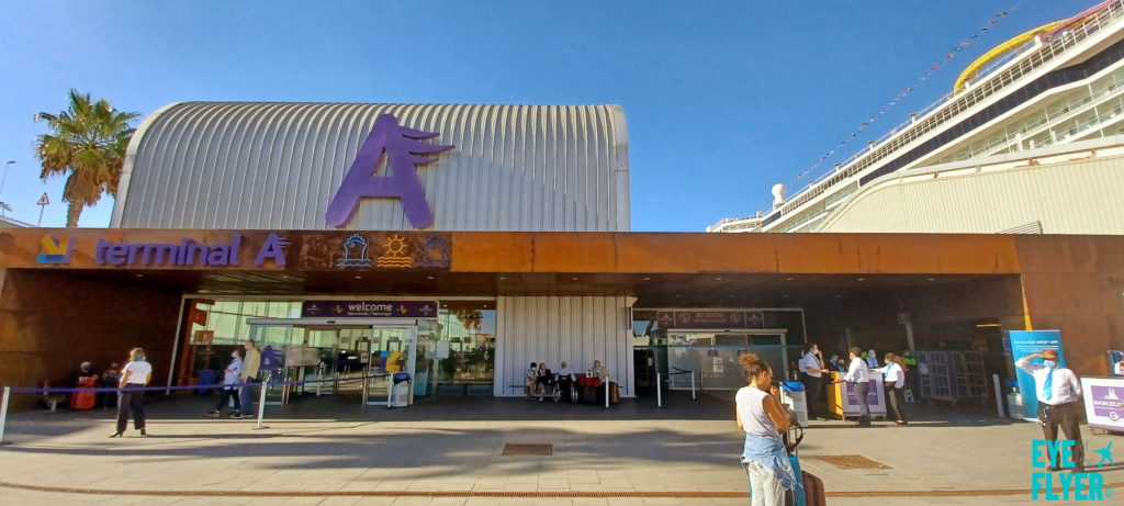 a building with a large purple sign
