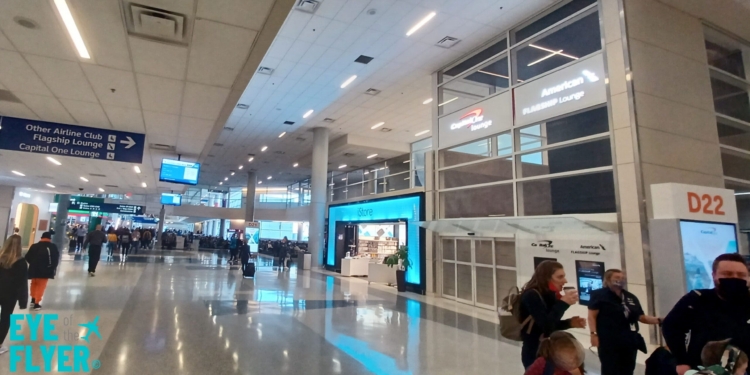 people walking in a large airport