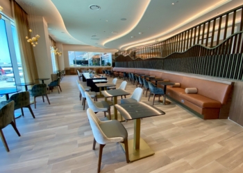 a room with tables and chairs