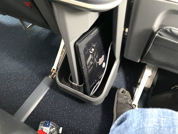 Laptop and tablet storage cubby in the Delta Air Lines' Airbus A321neo First Class seating