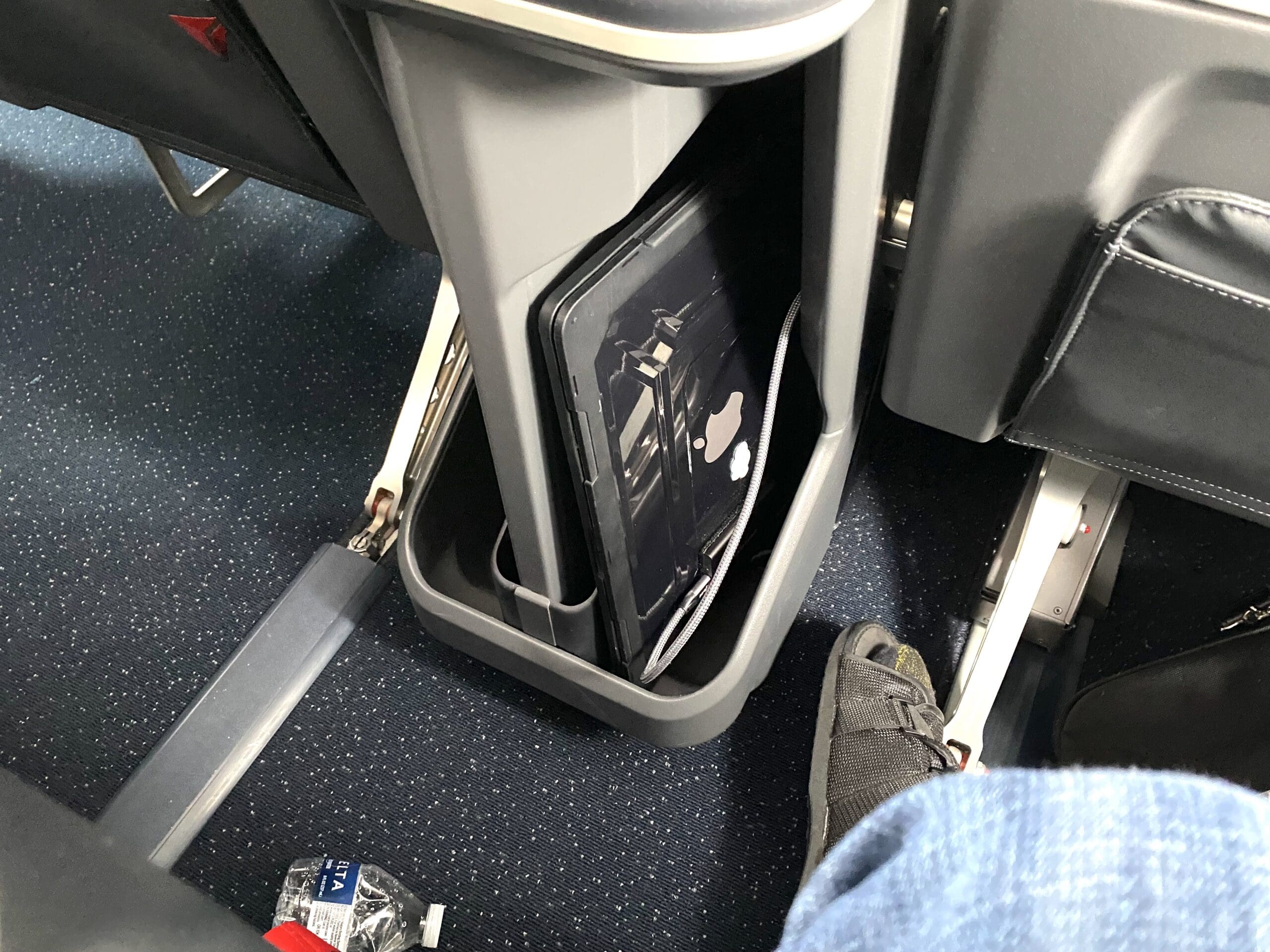 Laptop and tablet storage cubby in the Delta Air Lines' Airbus A321neo First Class seating