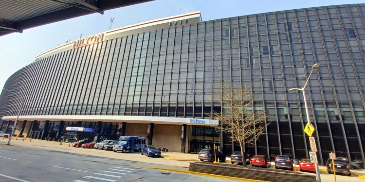 a building with cars parked in front of it