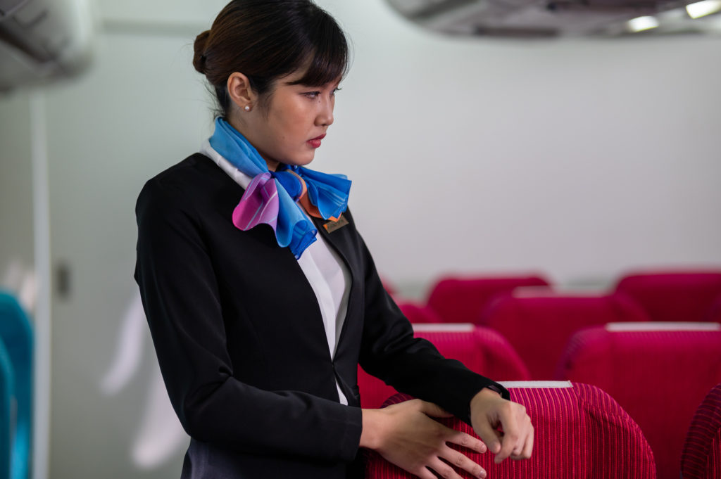 Sad flight attendant