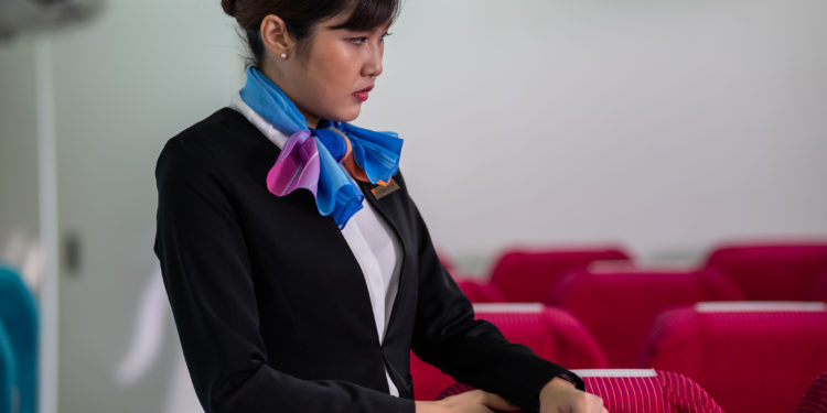 Sad flight attendant