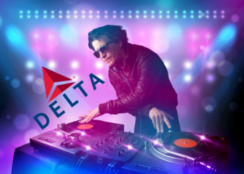 A DJ performs next a superimposed Delta Air Lines logo. (Delta Air Lines logo property of Delta Air Lines. DJ image ©iStock.com/ra2studio. Eye of the Flyer composite.)