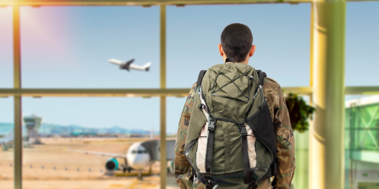 A military member at an airport