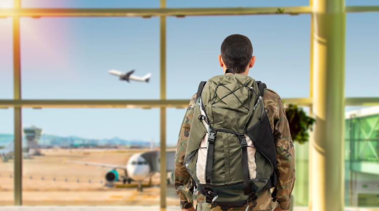 A military member at an airport