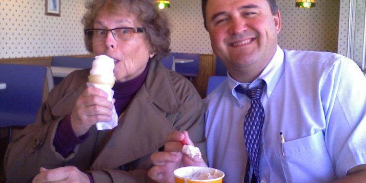 a man and woman eating ice cream