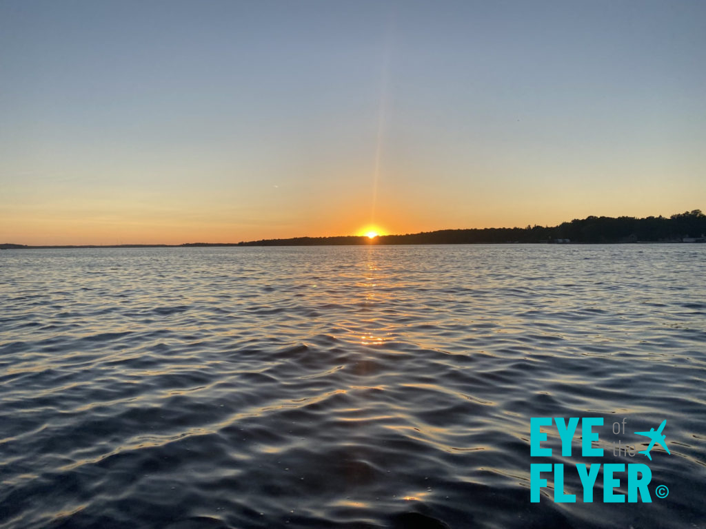 A sunset is seen during a summer evening at a Minnesota lake. © Christopher T. Carley for Eye of the Flyer.