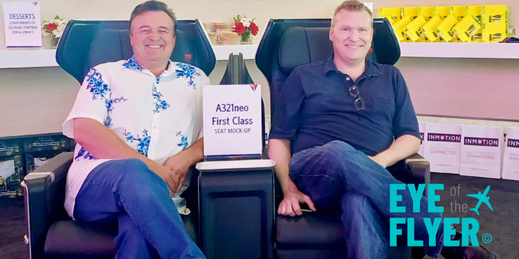 two men sitting in chairs